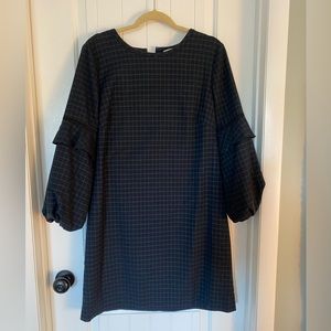 Black watch plaid shift dress with blouson sleeves.